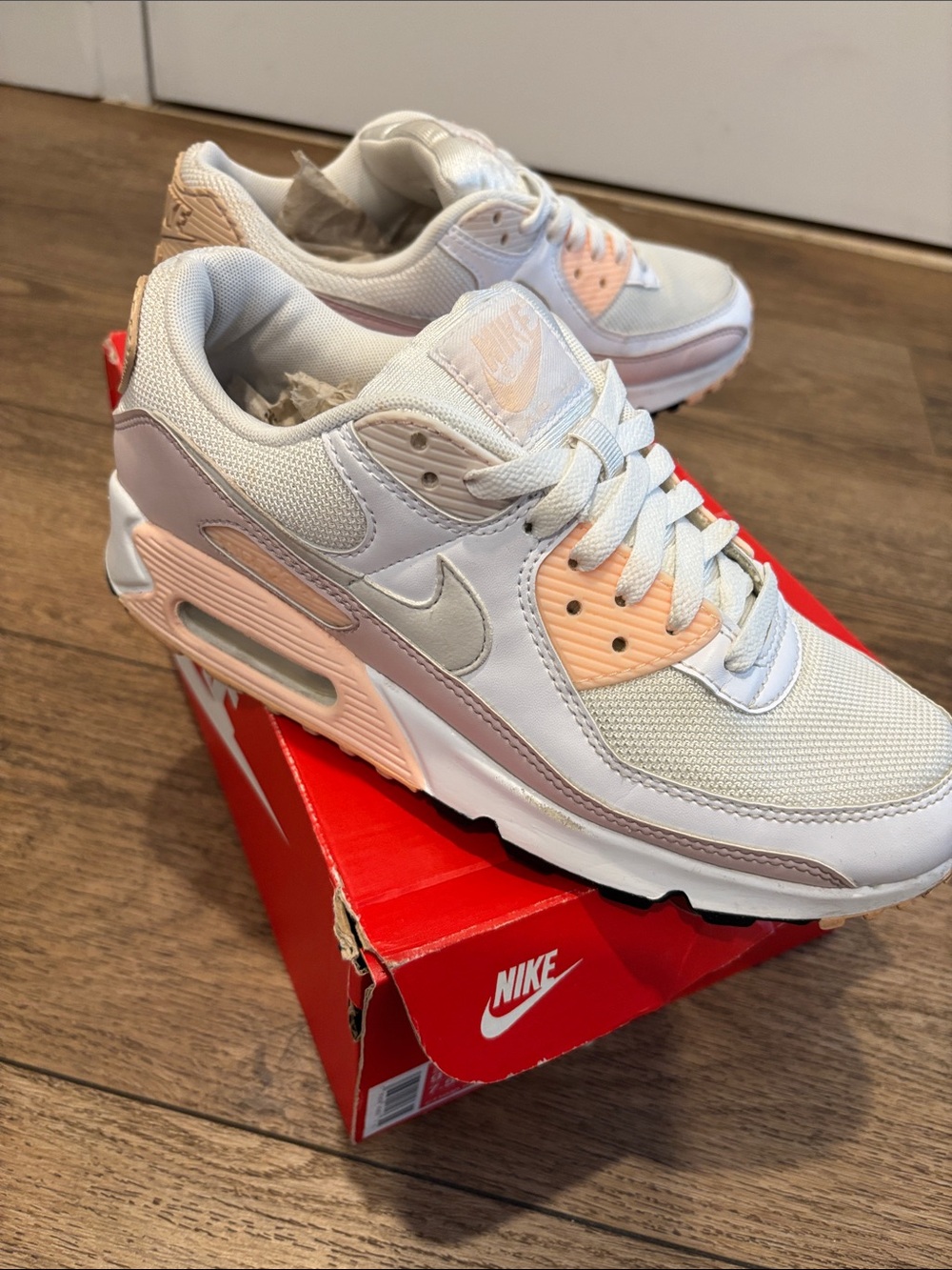 Nike Women's Low-Top Sneakers in White and Peach